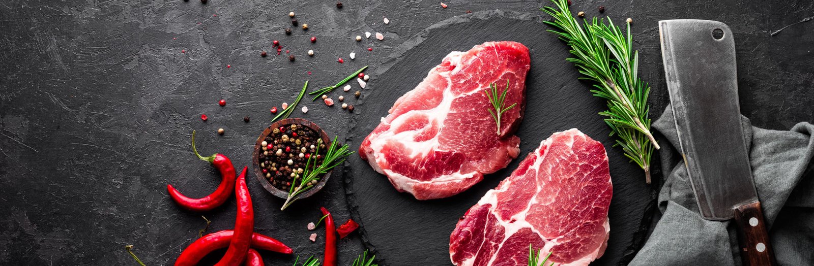 Butcher Block With Meat and Meat Clever
